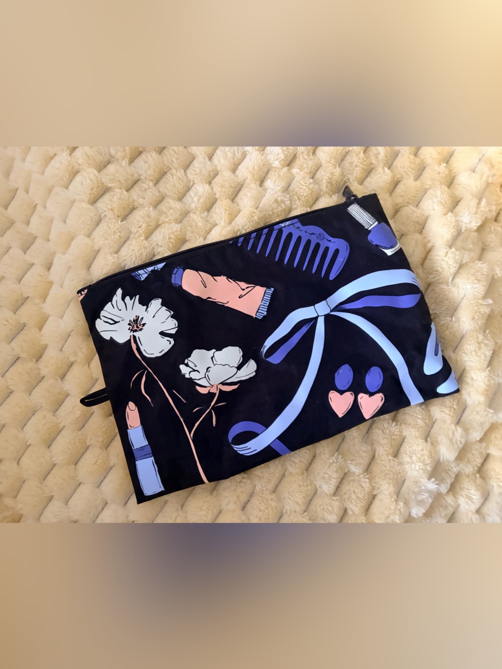 BAGGU large flat pouch in the "Get Ready With Me" print